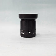a) Sigma 60mm f/2.8 DN Art Lens | Prime Lens | Sharp Portrait & Product Lens | Compact Mirrorless Lens | AB10